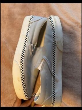 Vans White Slip-On Sneakers with Black Checkered Trim